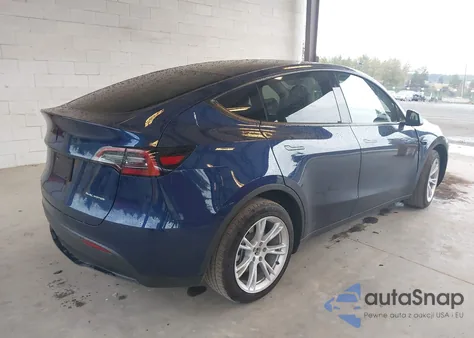 2023 Tesla Model Y Awd/Long Range Dual Motor All-Wheel Drive z USA, uszkodzony, nr VIN 7SAYGDEE2PF965905